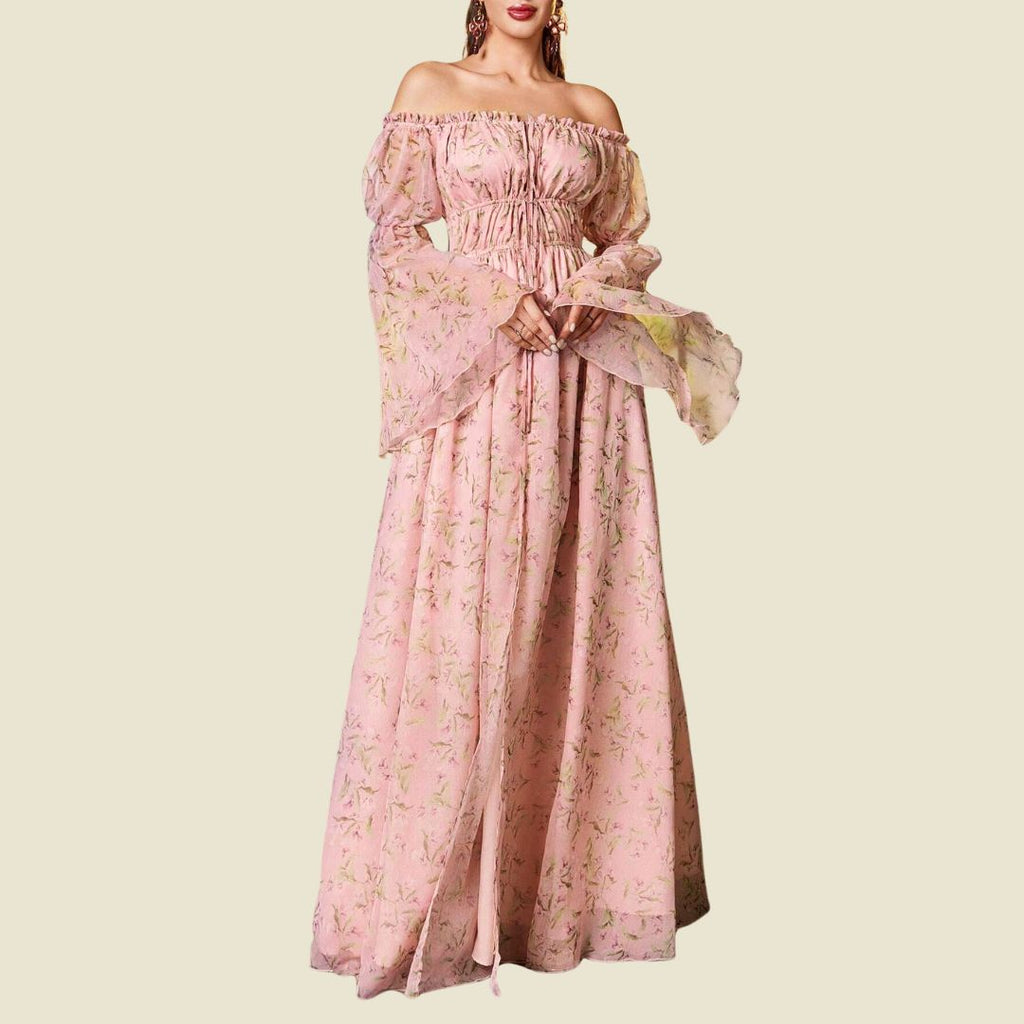 Sagolik vision: Ljusrosa maxiklänning med midjeresår och klockärmar