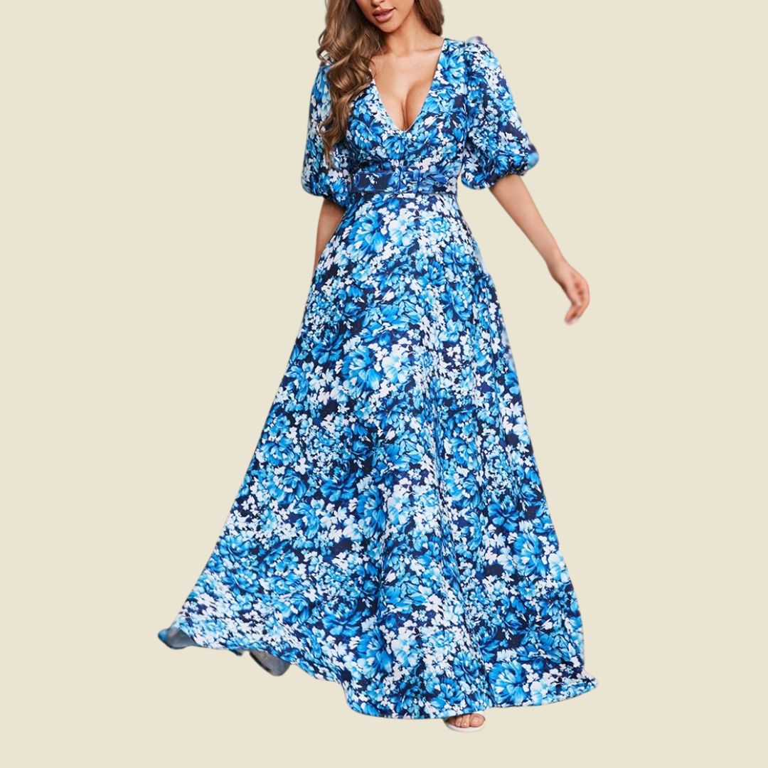 Medelhavsstil: V-ringad sommarklänning med pösärm och blomtryck