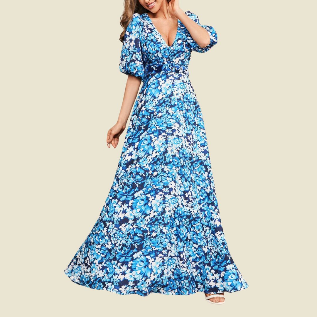 Medelhavsstil: V-ringad sommarklänning med pösärm och blomtryck