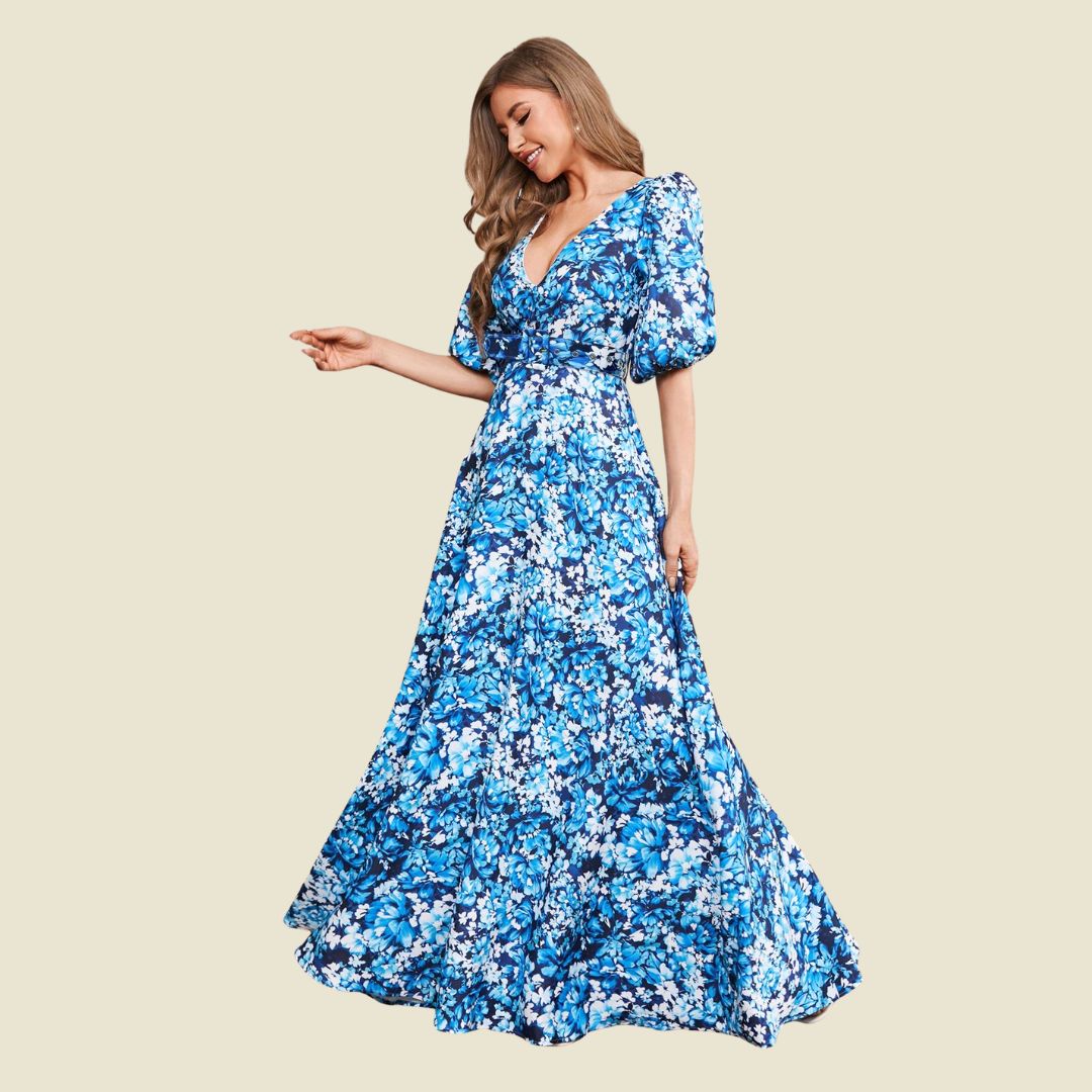 Medelhavsstil: V-ringad sommarklänning med pösärm och blomtryck