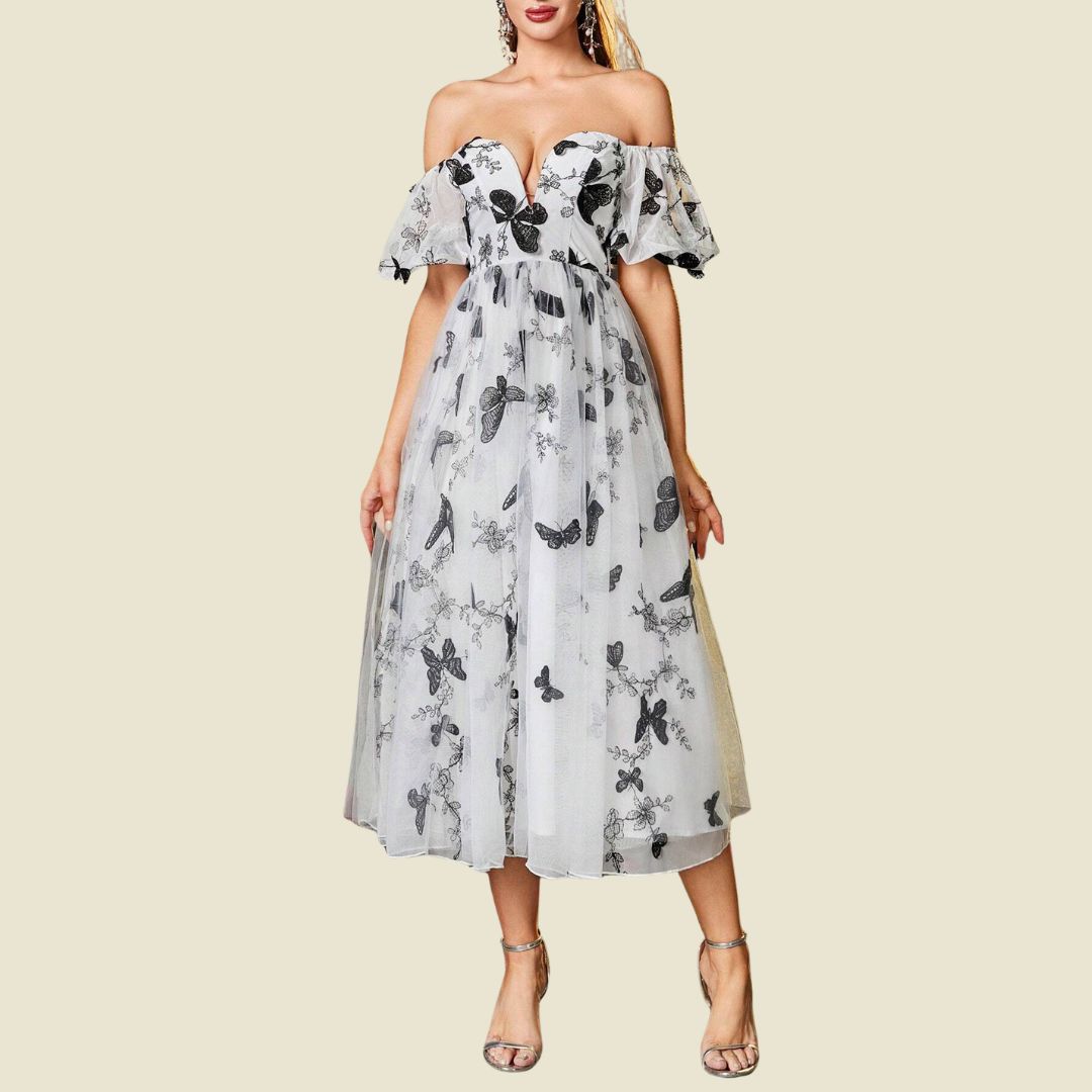 Magisk trädgård: Romantisk tyllklänning med midjeresår och fjärilar