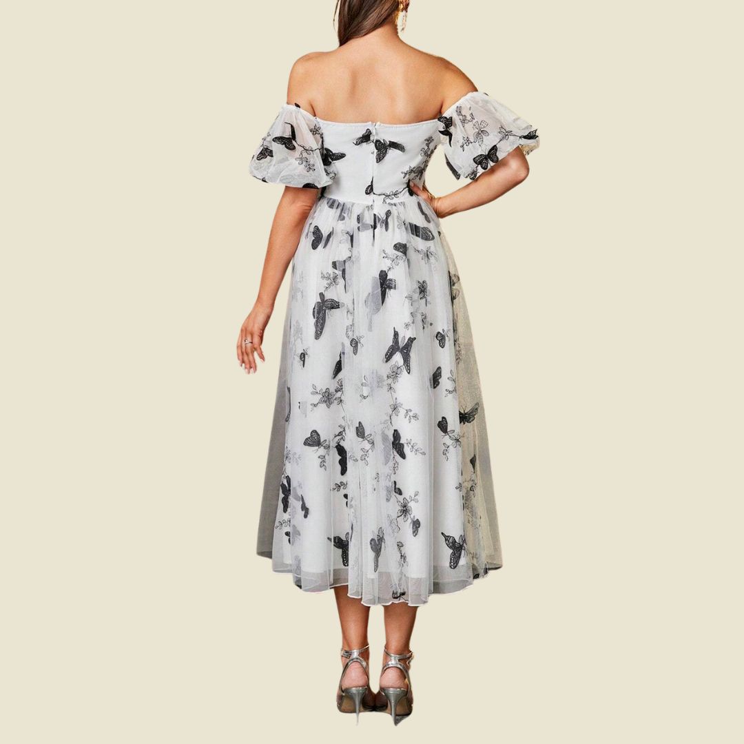 Magisk trädgård: Romantisk tyllklänning med midjeresår och fjärilar