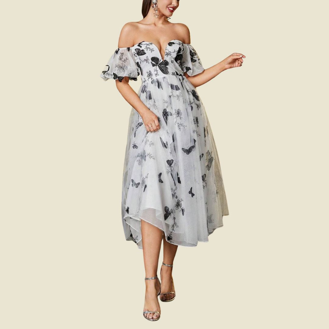 Magisk trädgård: Romantisk tyllklänning med midjeresår och fjärilar